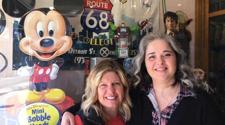 The destination for Wednesday’s Cash Mob in Xenia is Route 68 Vintage Toys and Collectibles, 68 South Detroit Street. Downtown Xenia property owner Jennifer Dunn (left), pictured with store owner Danielle Eldridge, said she is working to help revitalize the downtown area and started the monthly Cash Mob events to support downtown businesses. RICHARD WILSON/STAFF