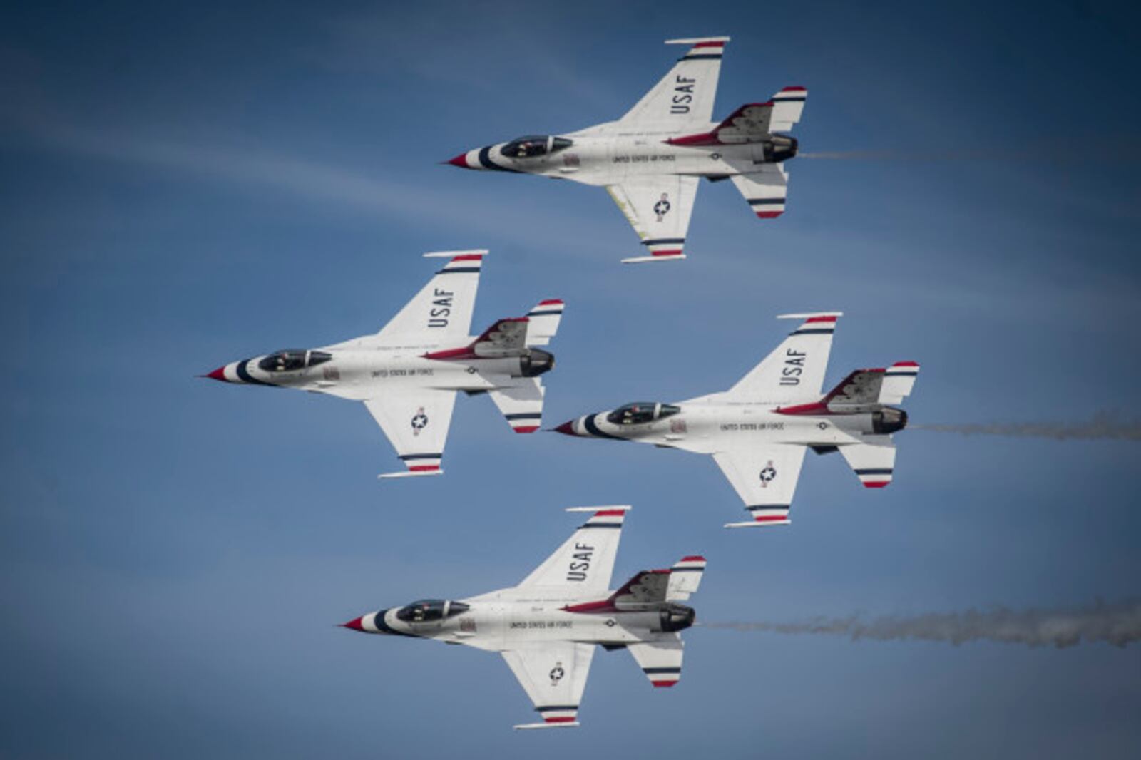 The U.S. Air Force Thunderbirds perform the Diamond Pass and Review during their performance at the Wings of Freedom Open House & Air Show, Altus AFB, OK, September 13, 2014. (U.S. Air Force photo/Master Sgt. Stan Parker)