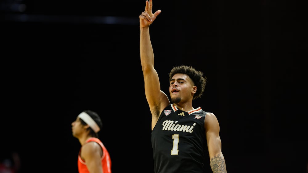 Miami's Trey Perry celebrates after hitting a 3-pointer during the second half of their game against Bowling Green on Friday, Feb. 20, 2026 at Millet Hall. JEREMY MILLER / CONTRIBUTED PHOTO