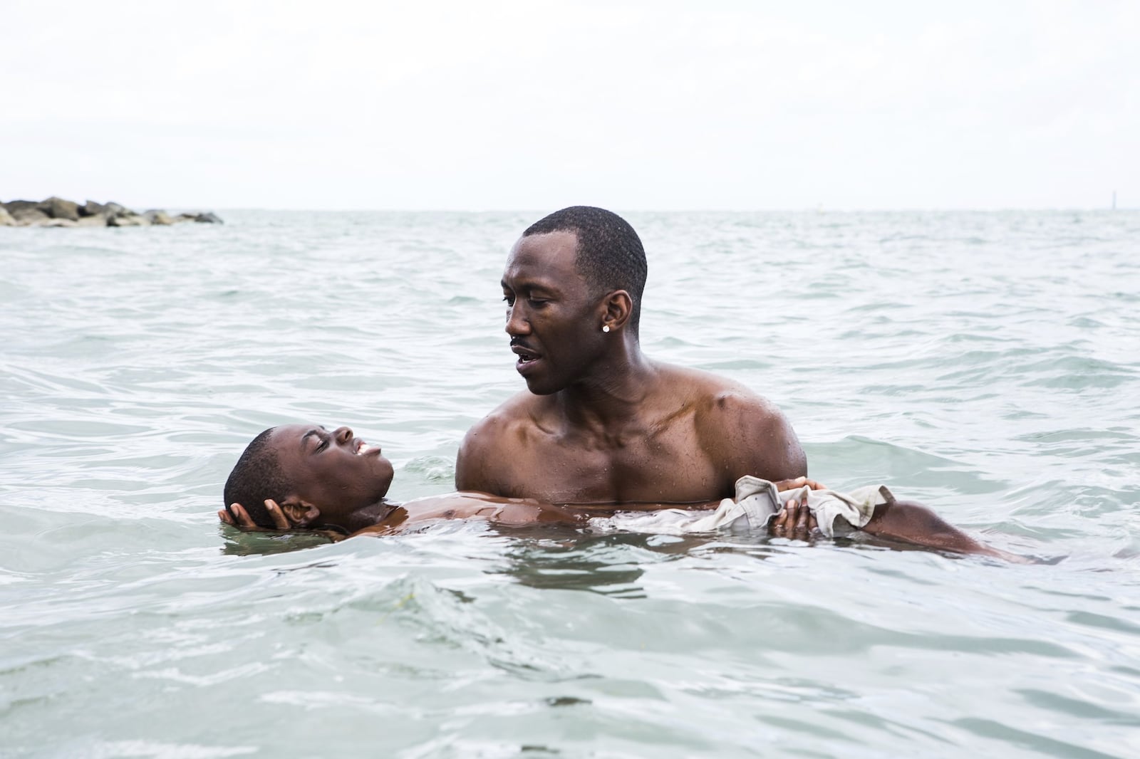 Alex Hibbert, left, and Mahershala Ali star in “Moonlight.” Contributed by David Bornfriend/A24