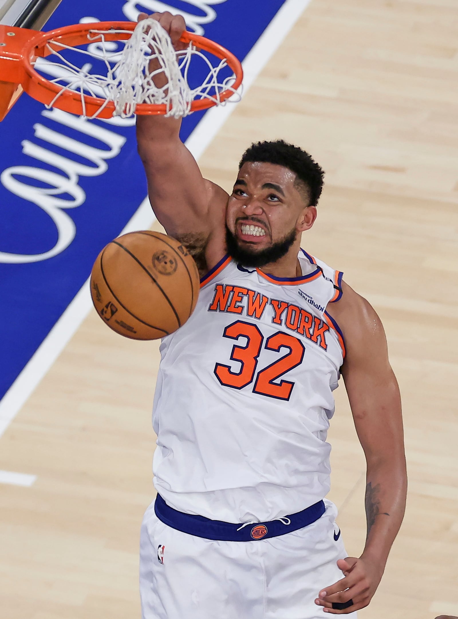 New York Knicks center Karl-Anthony Towns (32) scores against the Indiana Pacers during the fourth quarter of Game 5 of the NBA basketball Eastern Conference final, Thursday, May 29, 2025, in New York. (AP Photo/Adam Hunger)