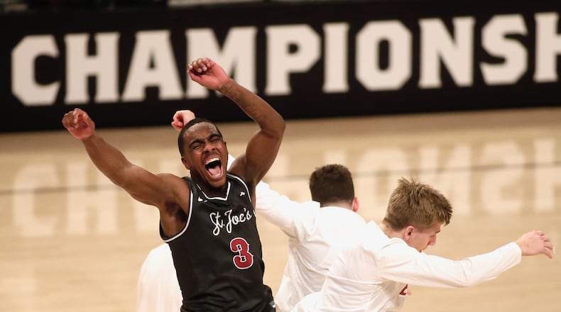 Cameron Brown, of Saint Joseph's, celebrates a victory against Richmond in the quarterfinals of the Atlantic 10 Conference tournament on Thursday, March 14, 2024, at the Barclays Center in Brooklyn, N.Y. David Jablonski/Staff