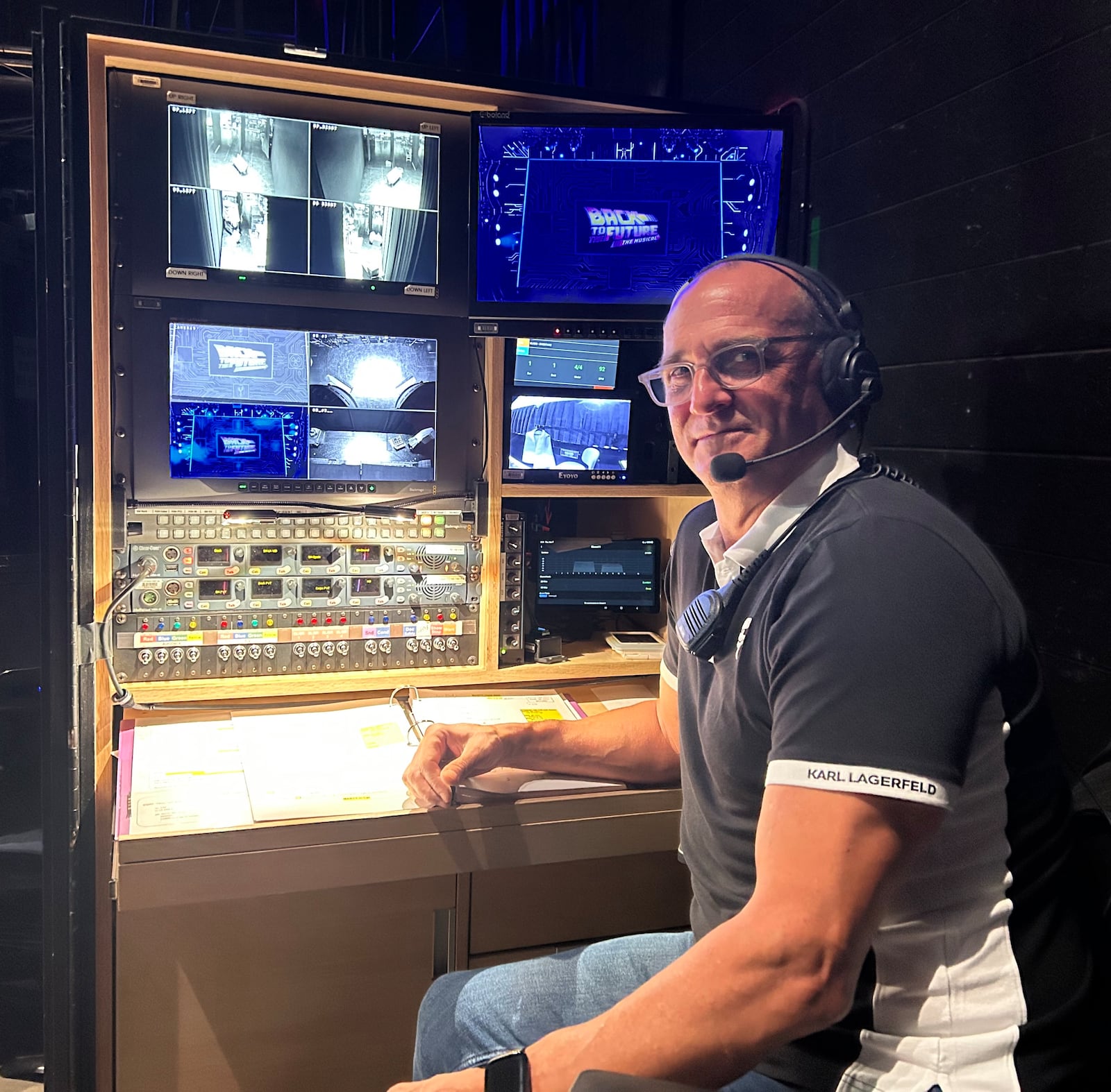 Eric Sprosty is pictured backstage at the calling desk where he calls the cues for "Back to the Future."
DOMINGO MANCUELLO/ CONTRIBUTED