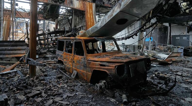 A view of the damages at Hypercar, an auto service center, which according to the company's officials were caused by strikes on March 1, in Tehran, Iran, Saturday, March 28, 2026. (AP Photo/Vahid Salemi)