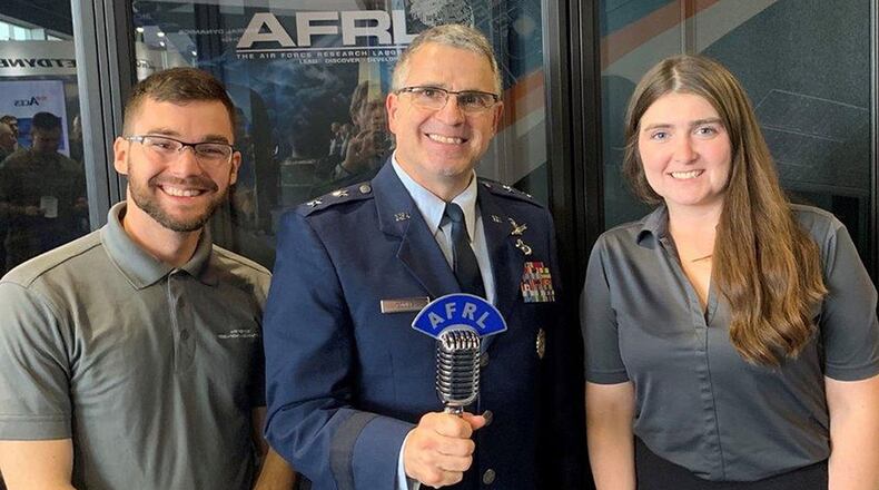 Maj. Gen. William Cooley, commander of the Air Force Research Laboratory, joins AFRL Lab Life podcast co-hosts Kenneth McNulty and Michele Miller at the Lab Life podcast booth during the 2019 Air, Space and Cyber conference in September. Cooley joined other senior Air Force leaders as guests on the podcast, sharing views on Air Force science and technology growth. (Courtesy photo)