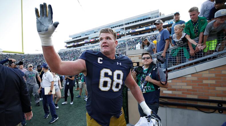 SOUTH BEND, IN - SEPTEMBER 02: Mike McGlinchey #68 of the Notre Dame Fighting Irish celebrates as he leaves the field following a game against the Temple Owls at Notre Dame Stadium on September 2, 2017 in South Bend, Indiana. The Irish won 49-16. (Photo by Joe Robbins/Getty Images)