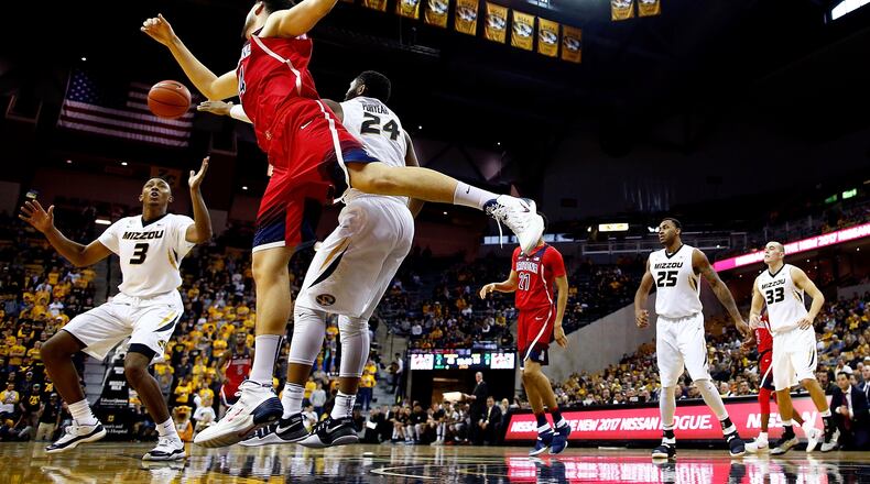 Missouri’s Frankie Hughes, left, competes for a rebound against Arizona at Mizzou Arena on December 10, 2016 in Columbia, Missouri. (Photo by Jamie Squire/Getty Images)