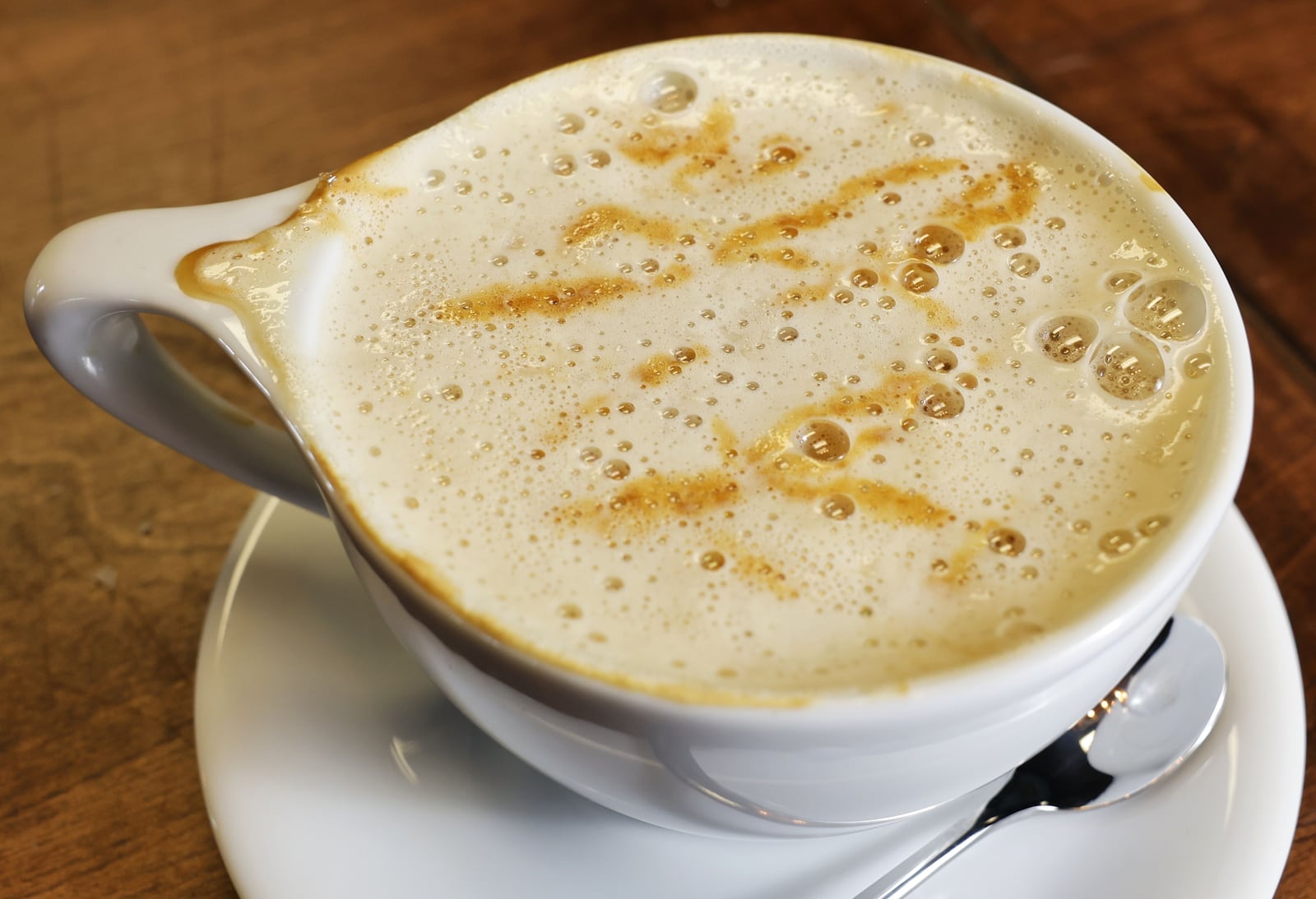 Chowdown Cafe is open at 8095 Beckett Center Dr. in West Chester Township. The location offers a variety of specialty coffee drinks, wine, sandwiches and pastries and more. NICK GRAHAM/STAFF