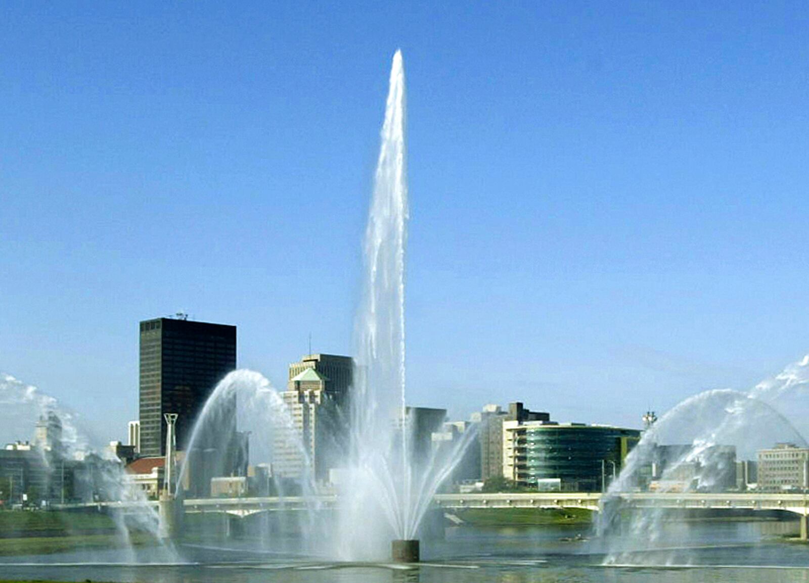 The Five Rivers Fountain at the confluence of the Great Miami and Mad rivers runs Tuesday, May 20, in downtown Dayton. Staff photo by Chris Stewart