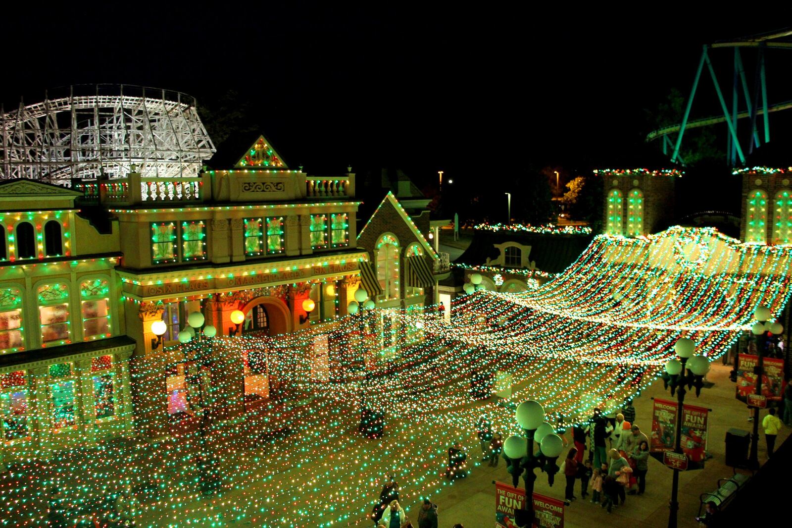 A canopy of 165,000 red, green and white lights hang high above Main Street at Six Flags for Holiday in the Park.