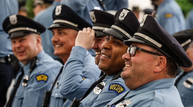 Dayton police officers attend the Montgomery County Law Enforcement Memorial Ceremony held at RiverScape May 3, 2024. JIM NOELKER/STAFF