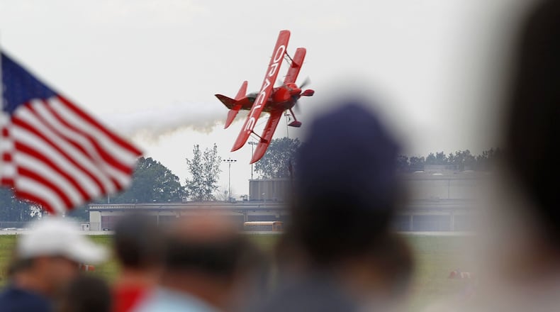 Sean D. Tucker flies his second to last solo performance in the Oracle Challenger III biplane in Dayton on Saturday at the Vectren Dayton Air Show. The plane is to be retired to the Smithsonian Air & Space Museum in December. TY GREENLEES / STAFF