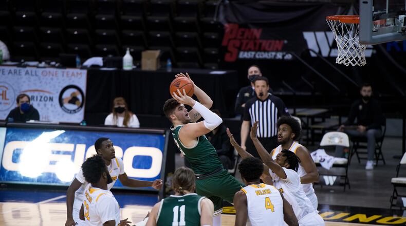 Wright State's Grant Basile puts up a shot during Friday's game at NKU. After losing Friday night, the Raiders bounced back to beat the Norse on Saturday to clinch a share of the Horizon League title. Joseph Craven/Wright State Athletics