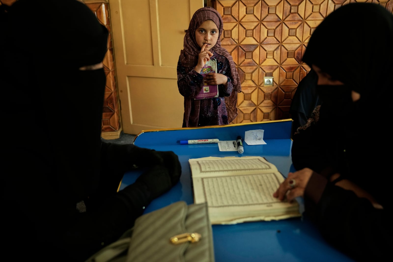 Afghan girls attend a religious studies class at a religious school in Kabul, Afghanistan, Wednesday, May 28, 2025. (AP Photo/Ebrahim Noroozi)