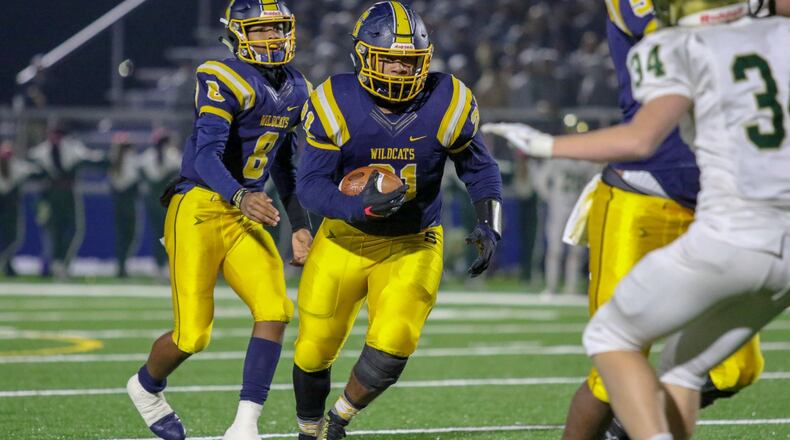 Springfield High School senior running back Tay’Veon Smoot runs the ball during the Wildcats 37-14 victory over Dublin Jerome in a D-I, Region 2 semifinal game at Marysville High School on Friday, Nov. 15. CONTRIBUTED PHOTO BY MICHAEL COOPER