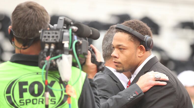 Ohio State’s Demetrius Knox hugs Urban Meyer after arriving at Ohio Stadium before a game against Penn State on Saturday, Oct. 28, 2017, in Columbus. David Jablonski/Staff