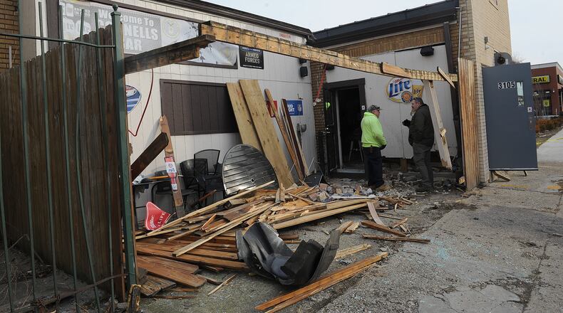 Tuesday, Feb. 15, 2022, a vehicle crashed into two businesses in the 3100 block of East Third Street. No injuries were reported. MARSHALL GORBY\STAFF