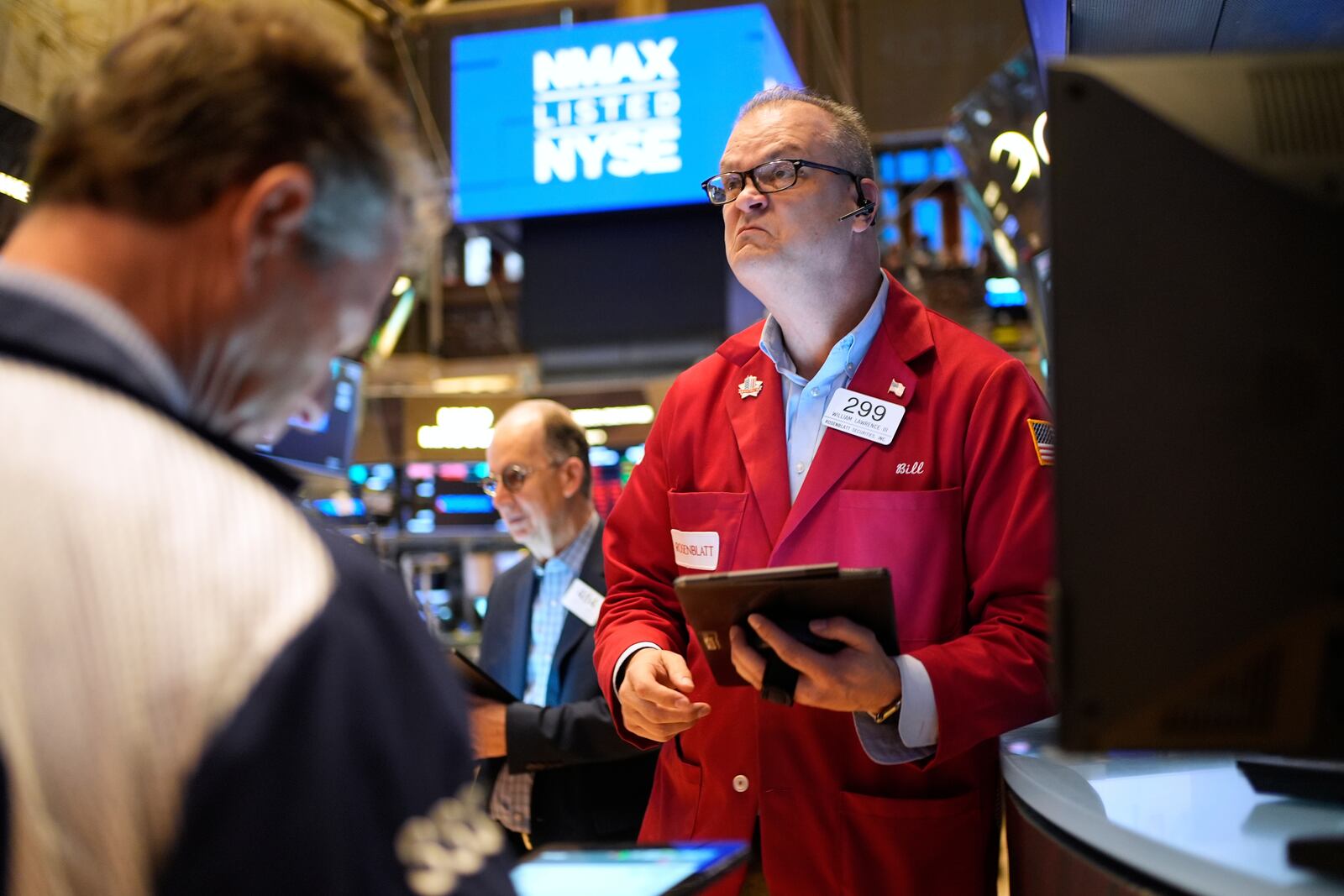 Bill Lawrence works on the floor at the New York Stock Exchange in New York, Thursday, April 3, 2025. (AP Photo/Seth Wenig)