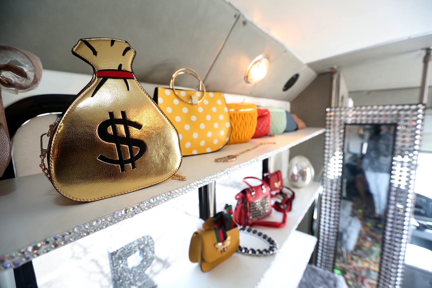 PHOTOS: Former shuttle bus has a new life as a mobile fashion boutique