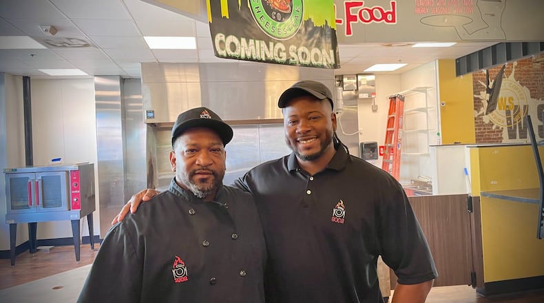 Shafton Greene (left), the owner of SOCA, is opening Urban Cheesesteak Co. with his son, Shafton “Wesley” Greene Jr. (right), inside W. Social Tap & Table in Dayton. NATALIE JONES/STAFF