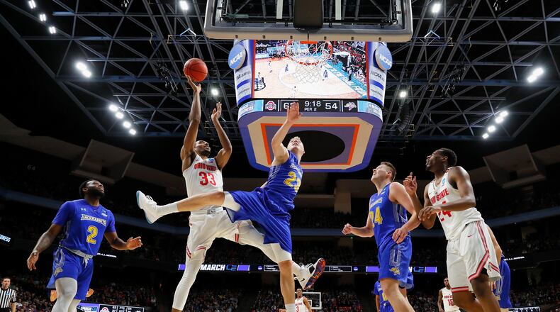 BOISE, ID - MARCH 15: Keita Bates-Diop #33 of the Ohio State Buckeyes shoots the ball against Reed Tellinghuisen #23 of the South Dakota State Jackrabbits in the second half during the first round of the 2018 NCAA Men's Basketball Tournament at Taco Bell Arena on March 15, 2018 in Boise, Idaho. (Photo by Ezra Shaw/Getty Images)