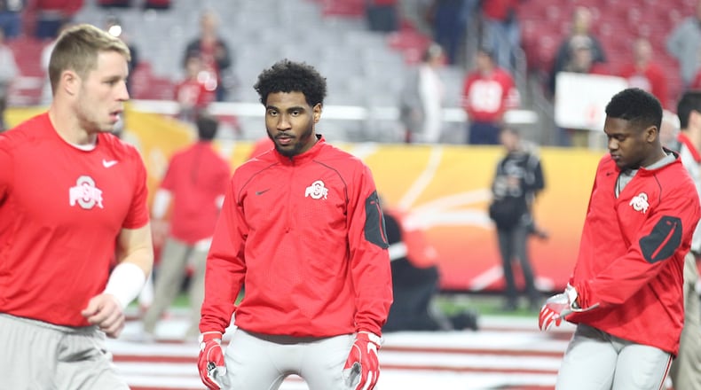 Ohio State's Braxton Miller stretches before the Fiesta Bowl on Friday, Jan. 1, 2016, at University of Phoenix Stadium in Glendale, Ariz. David Jablonski/Staff