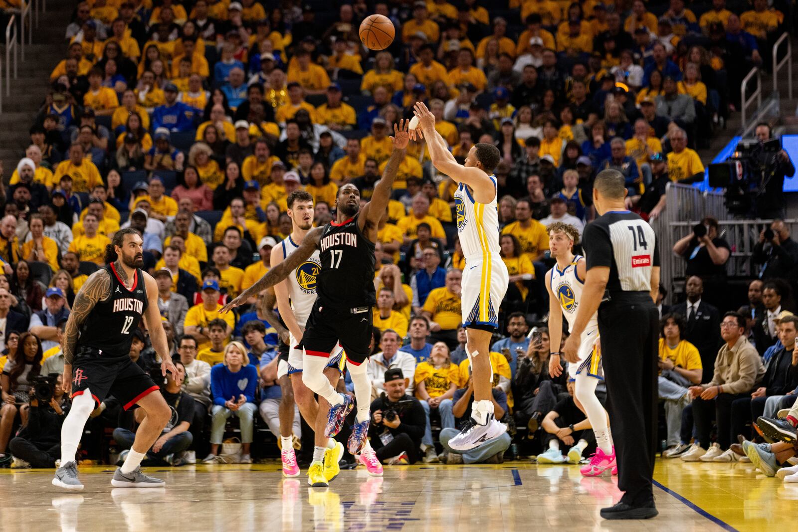 Golden State Warriors guard Stephen Curry (30) shoots a three-point shotduring the second quarter in game 3 of the NBA Western Conference First Round against the Houston Rockets in San Francisco, Saturday, April 26, 2025. (Stephen Lam/San Francisco Chronicle via AP)
