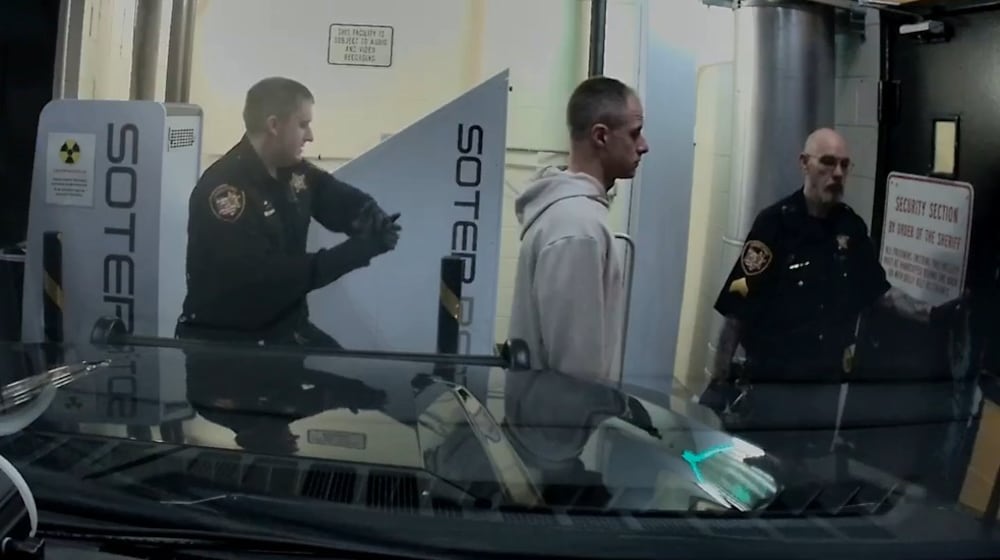 Caleb Flynn arrives at a detention facility. TIPP CITY POLICE