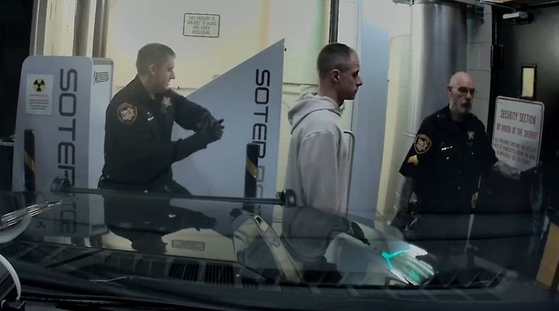 Caleb Flynn arrives at a detention facility. TIPP CITY POLICE