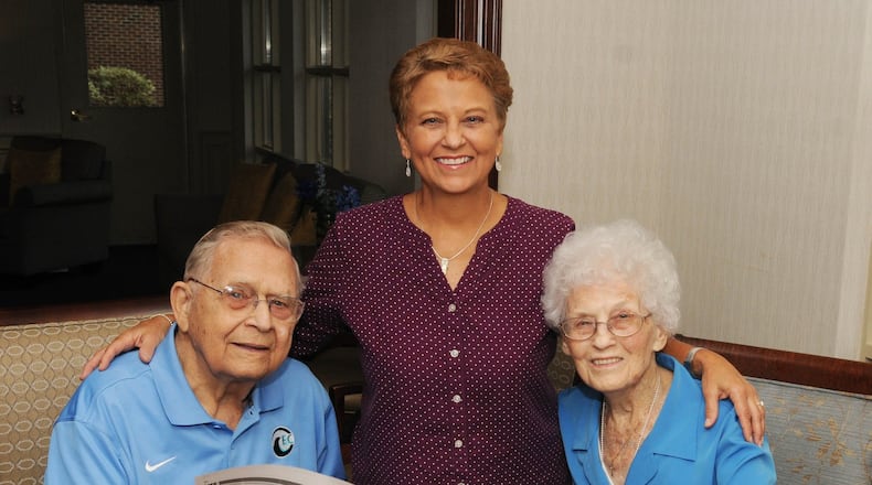 Pat Kinzig and her parents, Max and Koneta Schneider, said the Dayton Daily News has been an integral part of their lives for nearly 70 years. DAVID MOODIE/CONTRIBUTOR