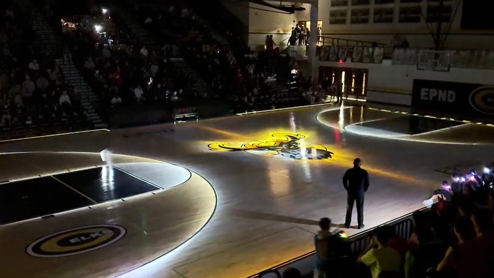 Centerville High School has added a new experience for fans as part of its pregame festivities at campus games. A state-of-the-art floor projection video is now shown on the court prior to the start of school’s games. With the lights turned off in the gym, the video highlights different parts of the floor with graphics and images of Elks’ players. STEPHEN WRIGHT/STAFF