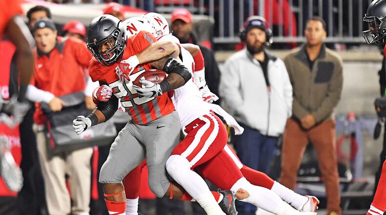 COLUMBUS, OH - NOVEMBER 5: Mike Weber #25 of the Ohio State Buckeyes powers his way to a 24-yard run to set up a touchdown in the third quarter against the Nebraska Cornhuskers at Ohio Stadium on November 5, 2016 in Columbus, Ohio. Ohio State defeated Nebraska 62-3. (Photo by Jamie Sabau/Getty Images)