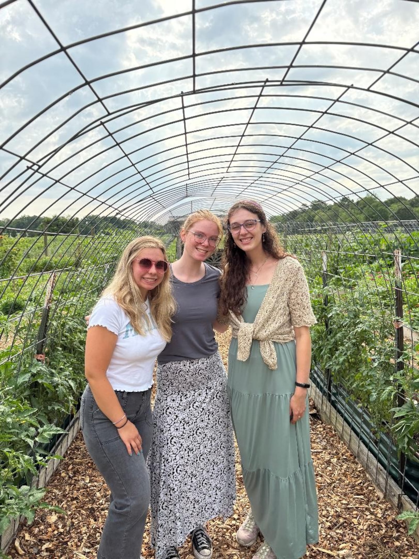 Left to right: University of Dayton students Grace Haas, Hannah Scheuller and Shannon Dennemann of UD's Hanley Sustainability Institute are interning with Five Rivers MetroParks this summer. Photo by Russell Florence Jr.