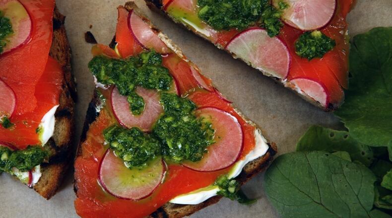 Salmon and radish green salsa verde toasts. (Glenn Koenig/Los Angeles Times/TNS)