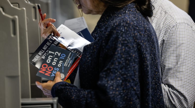 Early voters streamed into the Montgomery County Board of Elections Monday morning, Oct. 31, 2022. JIM NOELKER/STAFF