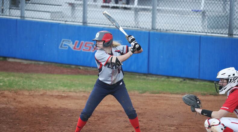 Dayton's Megan Ward hits during a game against Illinois State in March 2021. Photo by Erik Schelkun