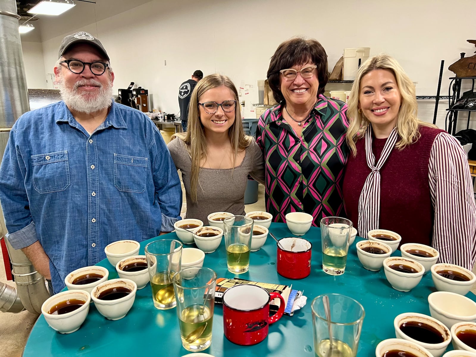 Twisted River Coffee Roaster owner Dan Clayton, Dayton Daily News reporter Natalie Jones, The Foodbank, Inc. CEO Michelle Riley and Dayton Daily News Editor Ashley Bethard chose the blend of Ethiopian and Sumatran beans during a tasting held in Twisted River's roastery in Dayton. 
