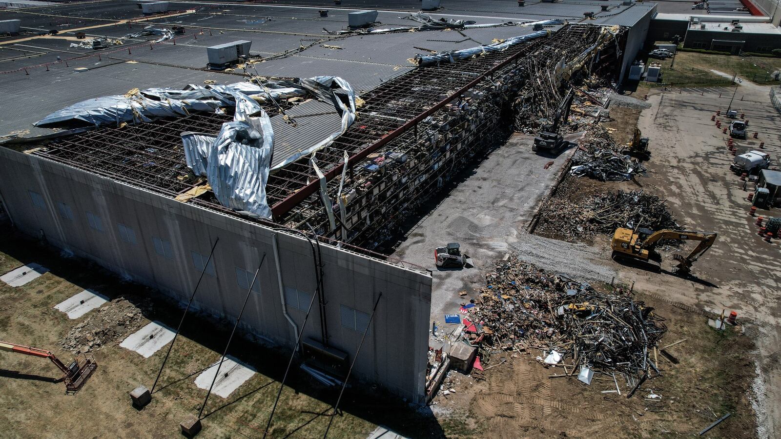 The Meijer Distribution Center in Tipp City was being repaired June 27, 2022, 19 days after a tornado ripped up the northwest corner of the building. Workers were removing pieces of the collapsed metal structure. JIM NOELKER/STAFF