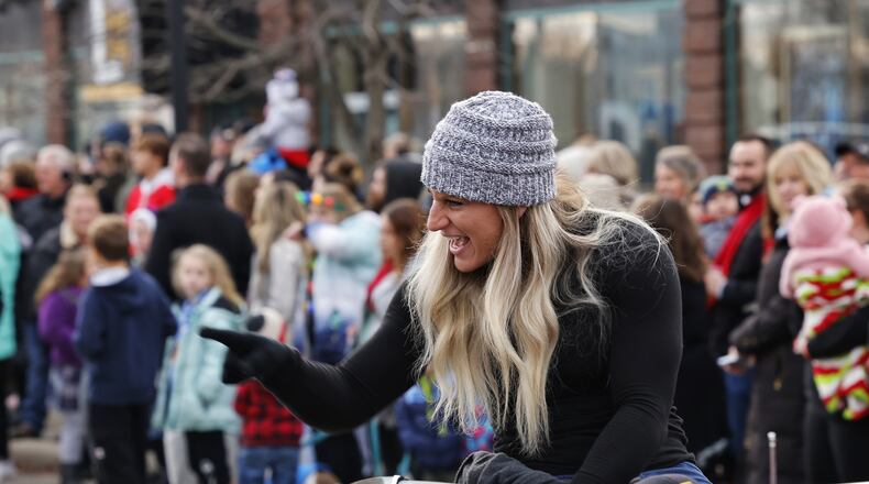 Kayla Harrison served as grand marshal for the Santa Parade kicking off Middletown Holiday Whopla events Saturday, Nov. 27, 2021 in downtown Middletown. NICK GRAHAM/STAFF