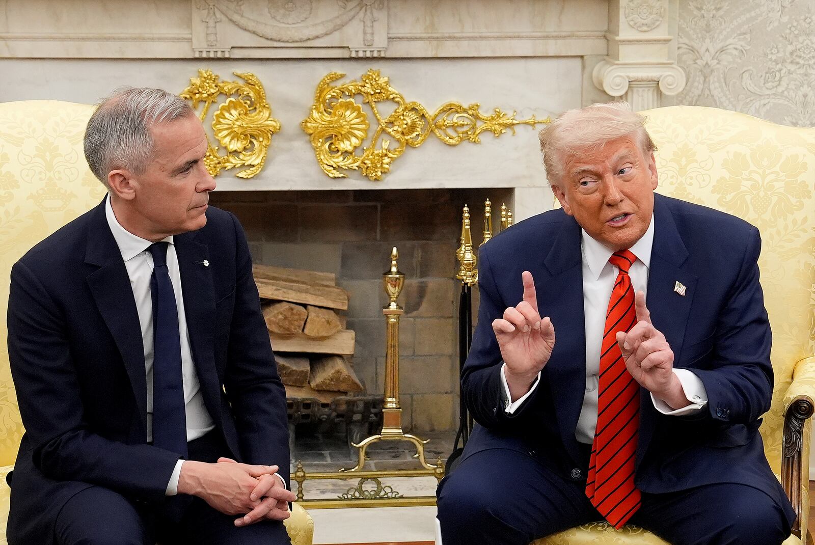 Prime Minister Mark Carney and U.S. President Donald Trump engage in a meeting at the White House in Washington, D.C., Tuesday, May 6, 2025. (Adrian Wyld /The Canadian Press via AP)