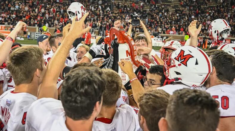 Miami celebrates its win over Cincinnati last year. Miami Athletics photo
