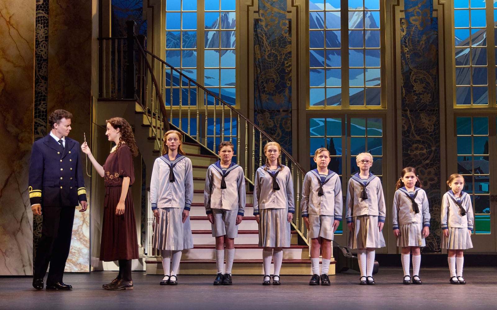 Kevin Earley (Captain Georg von Trapp) and Cayleigh Capaldi (Maria Rainer) with the von Trapp children in "The Sound of Music." JEREMY DANIEL/CONTRIBUTED