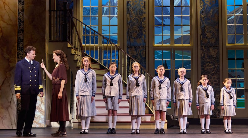 Kevin Earley (Captain Georg von Trapp) and Cayleigh Capaldi (Maria Rainer) with the von Trapp children in the Broadway national tour of "The Sound of Music." JEREMY DANIEL/CONTRIBUTED