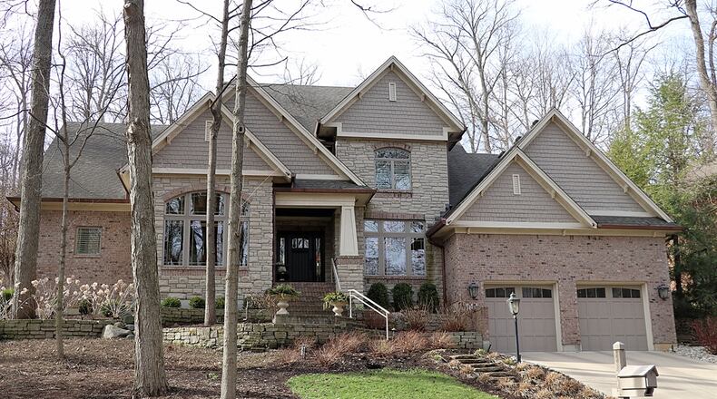 Located with The Ridge of west Kettering and listed for $885,000 by Coldwell Banker Heritage, the two-story at 4548 Royal Ridge Way has about 4,218 square feet of living space. Contributed photos