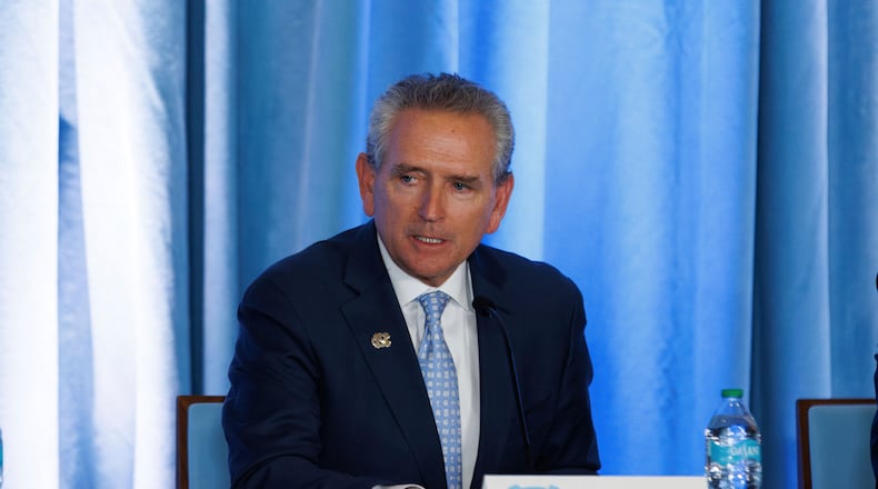 North Carolina athletic director Bubba Cunningham speaks during an NCAA college football press conference introducing Bill Belichick as UNC's new head football coach, Thursday, Dec. 12, 2024, at North Carolina in Chapel Hill, N.C. (AP Photo/Ben McKeown)