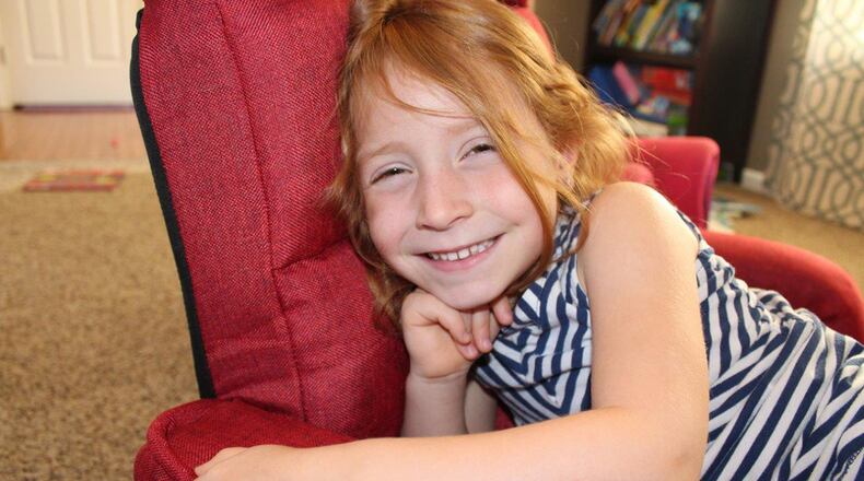 Aubrey Inman, 5, who has cystic fibrosis was selected as Ohio’s recipient of an AffloVest by the Colton Underwood Legacy Project. An AffloVest is a cordless treatment vest that allows the user to be mobile during a 30-minute treatment and is much lighter and quieter than a standard vest. Aubrey is the daughter of Tech. Sgt. Aimee Inman, Air Force Office of Special Investigations First Field Investigations Region, NCOIC Administration, and her husband, Bryan. (U.S. Air Force photos/Stacey Geiger)