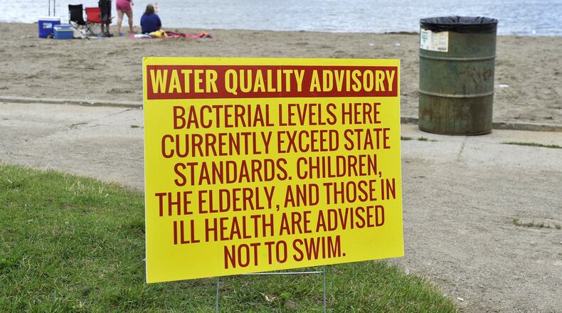 This sign was posted during a previous bacterial contamination advisory at Buck Creek State Park. Bill Lackey/Staff