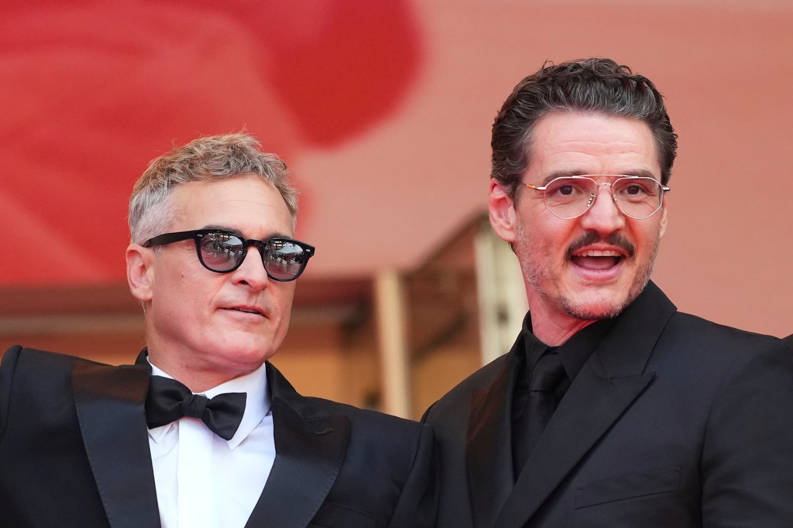 Joaquin Phoenix, left, and Pedro Pascal pose for photographers upon arrival at the premiere of the film 'Eddington' at the 78th international film festival, Cannes, southern France, Friday, May 16, 2025. (Photo by Scott A Garfitt/Invision/AP)