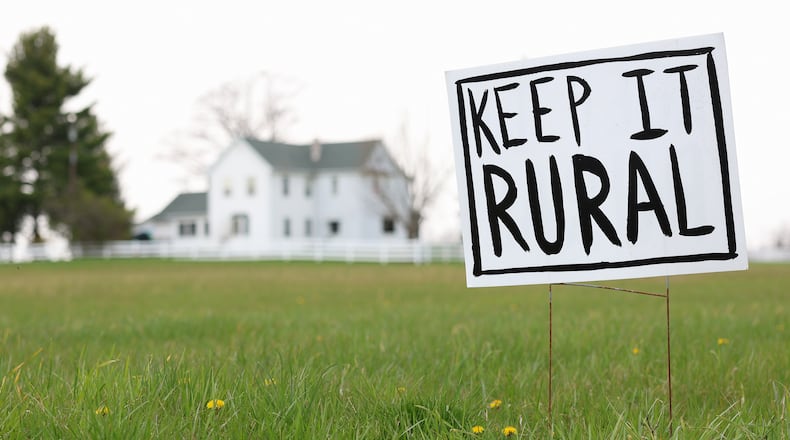 A "Keep It Rural" sign in a yard on the corner of Johnsville Brookville Road and Air Hill Road just outside Brookville. BRYANT BILLING / STAFF