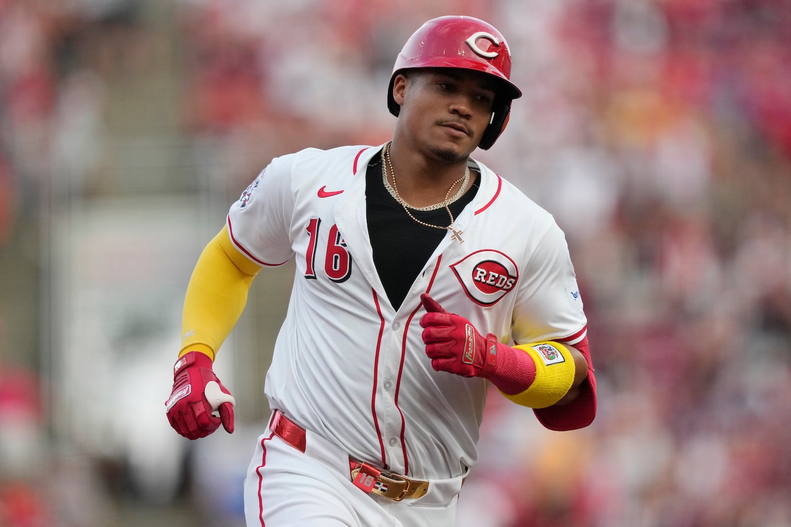 Cincinnati Reds' Noelvi Marte rounds the bases after hitting a solo home run during the fourth inning of a baseball game against the Los Angeles Dodgers, Tuesday, July 29, 2025, in Cincinnati. (AP Photo/Carolyn Kaster)